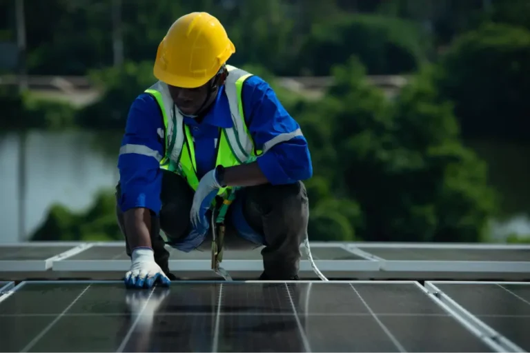 Obachaste worker installing Solar Panels